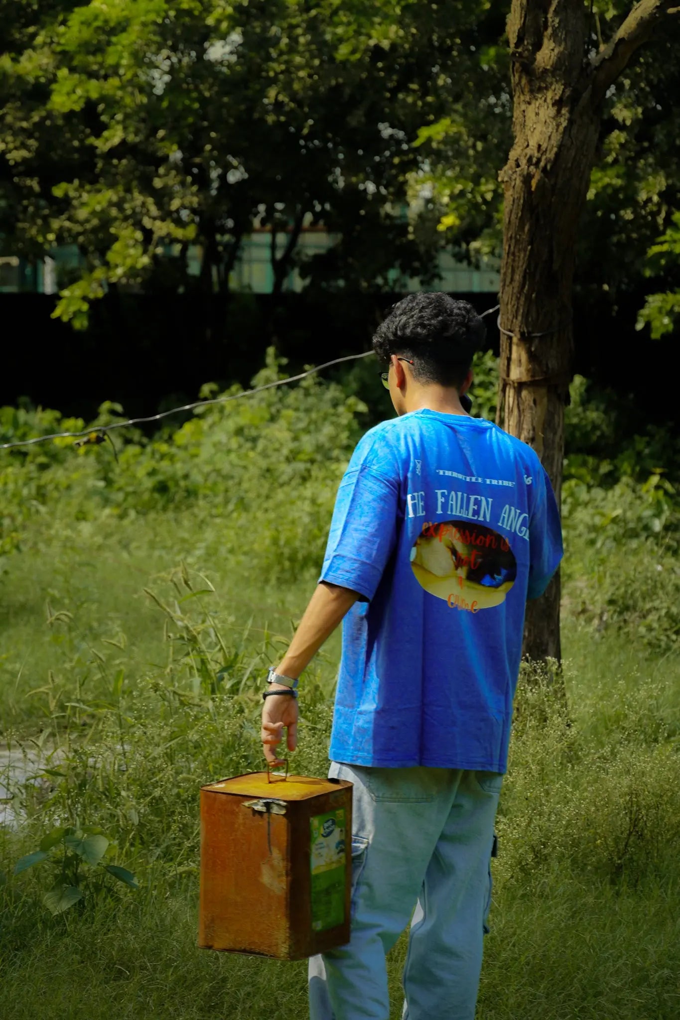 Fallen Angel – Blue Acid Wash Oversized T-Shirt with Lucifer Print | THROTTLE TRIBE My Store